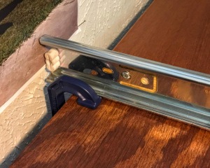 clamping of sliding monitor tray